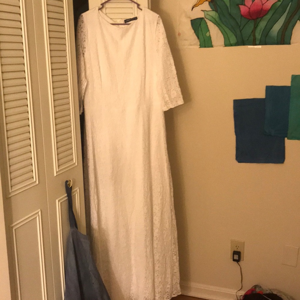 Floor length white lace gown